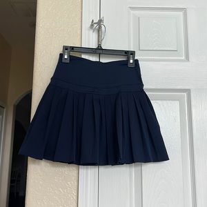 dark blue high waisted pleated tennis skirt